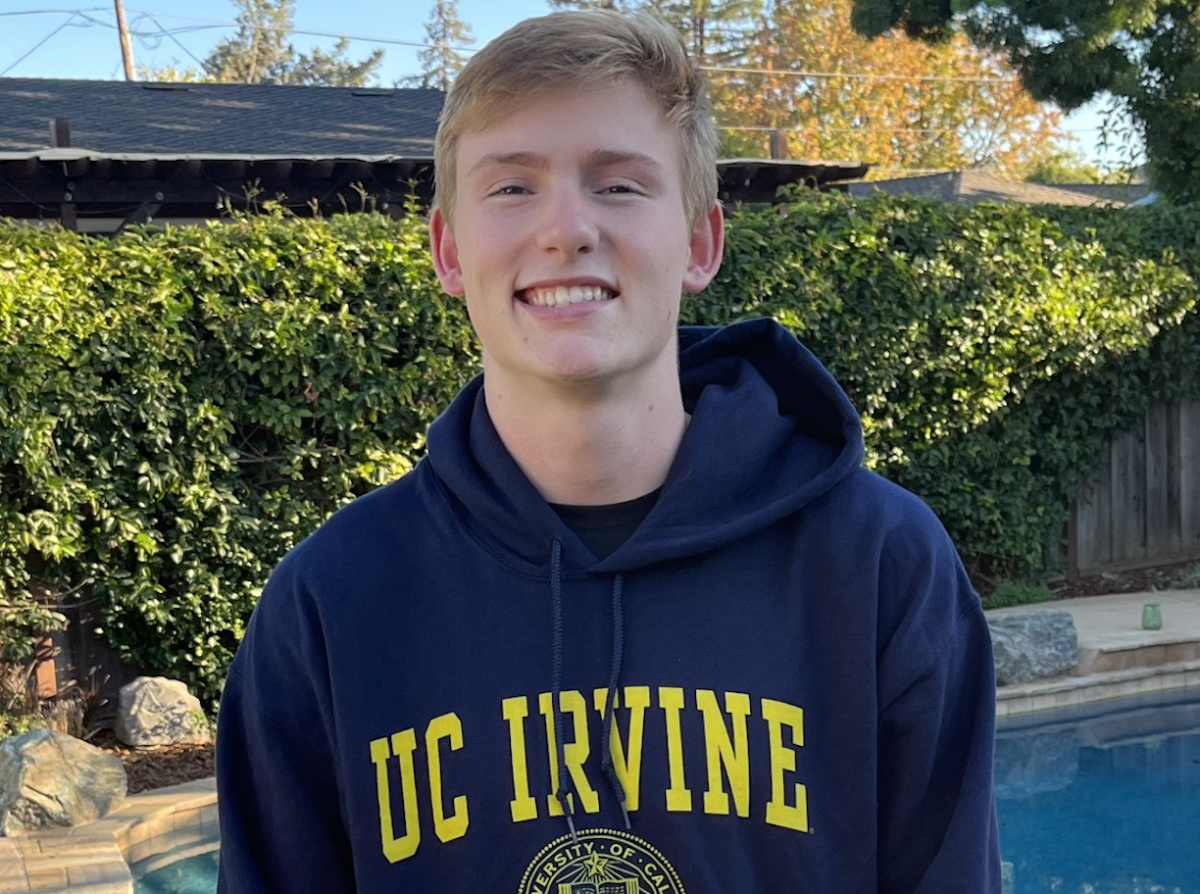 Senior Aidan Cuppett poses in University of California, Irvine gear. This fall, Aidan committed to UCI to play Division I volleyball.